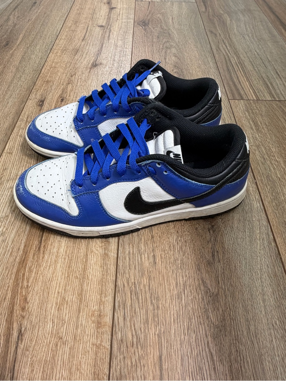 Nike Low-Top Sneakers in White, Blue, and Black